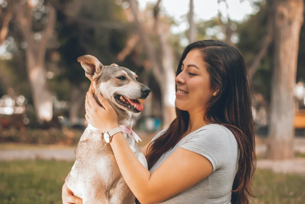 Happy customer Sarah with her dog
